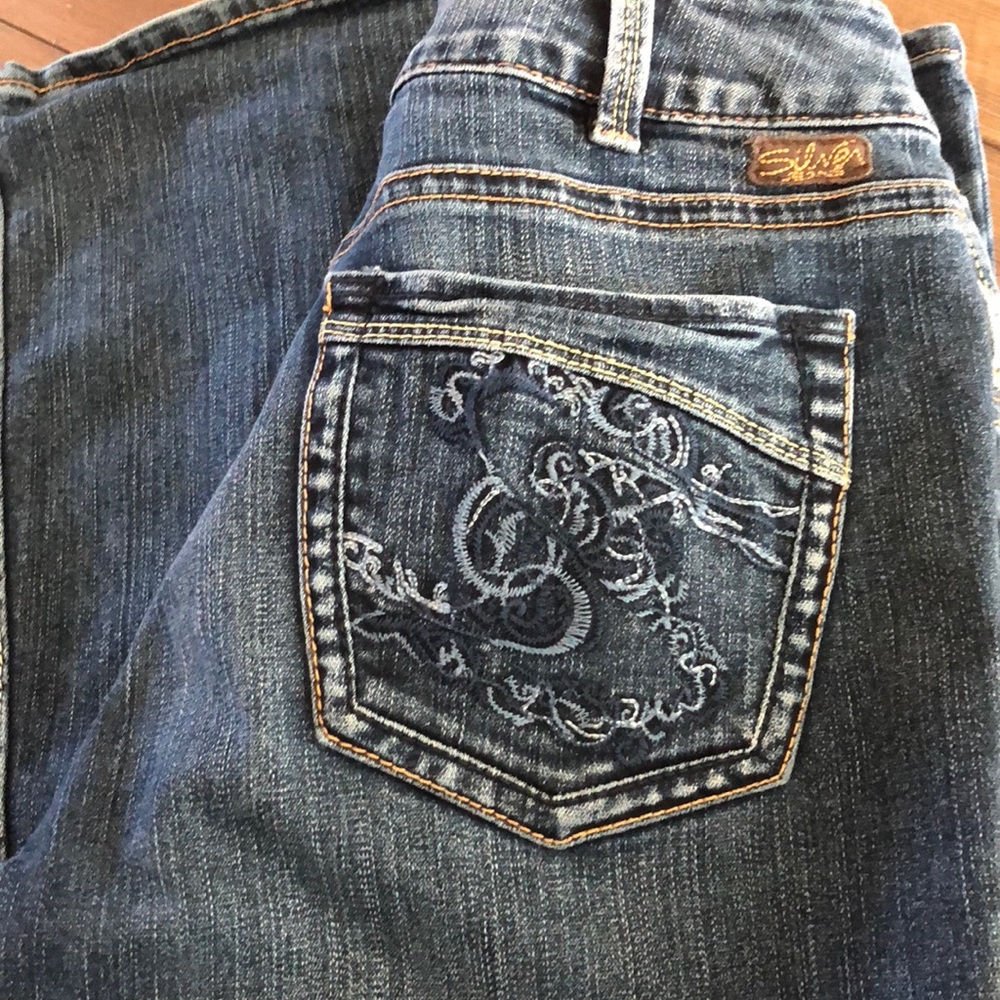 Silver Suki boot cut jeans 30x 32. EUC